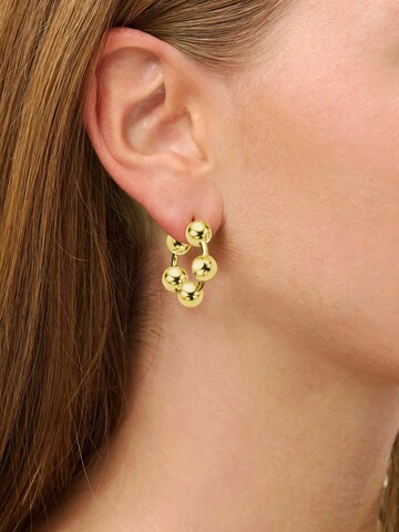Orecchini 'Big Atomic' di Jane Kønig in oro: frontale