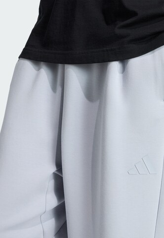 Loosefit Pantaloni sportivi 'Soft Lux' di ADIDAS SPORTSWEAR in grigio