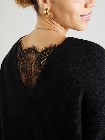 Robes en maille 'CARADELE' ONLY Carmakoma en noir