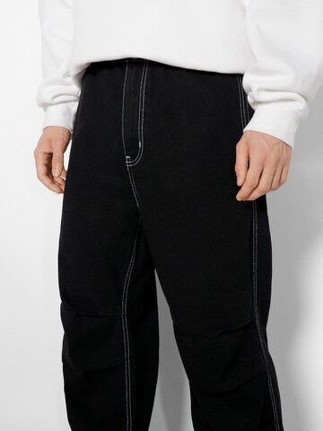 Bershka Loosefit Jeans in Schwarz