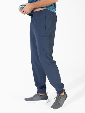 Effilé Pantalon de sport Spyder en bleu
