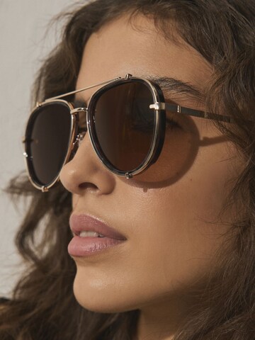 Next Sončna očala | zlata barva