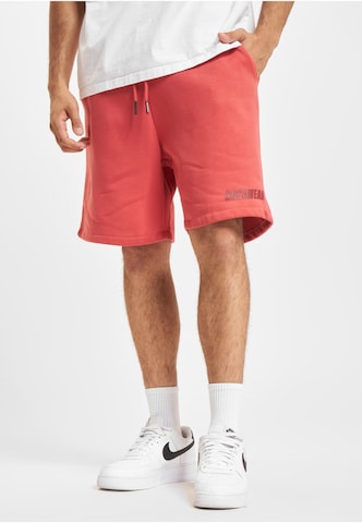 ROCAWEAR Regular Trousers in Red: front