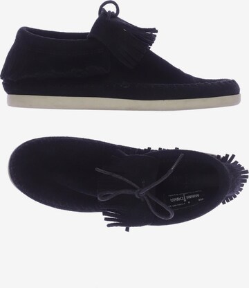 Minnetonka Flats & Loafers in 39 in Black: front