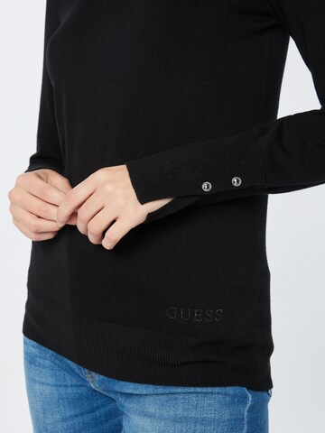 Pulover de la GUESS pe negru