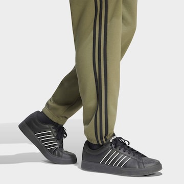 ADIDAS SPORTSWEAR Tapered Workout Pants in Green