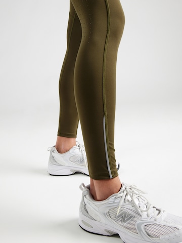 UNDER ARMOUR Skinny Παντελόνι φόρμας 'Fly Fast 3.0' σε πράσινο