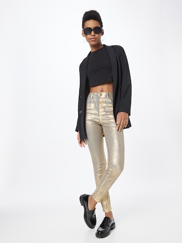 River Island Slimfit Jeans i guld