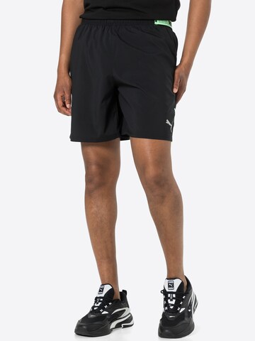 PUMA Loosefit Sportbroek in Zwart: voorkant