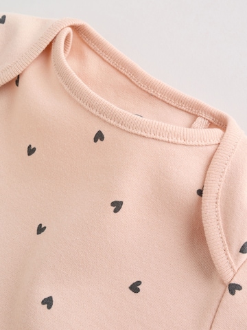 Tutina / body per bambino di Next in beige