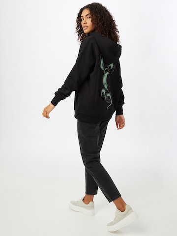 ABOUT YOU Limited Sweatshirt 'Romy' by Swantje Paulina in Schwarz