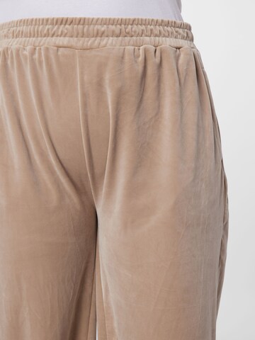 Wide leg Pantaloni di Urban Classics in beige