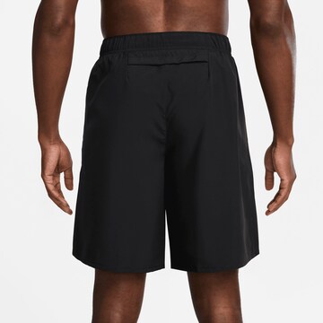 NIKE Regular Workout Pants in Black