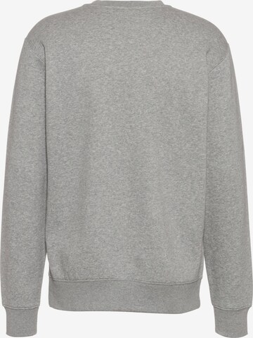 Nike Sportswear Tapered Athletic Sweatshirt 'Club Fleece' in Grey