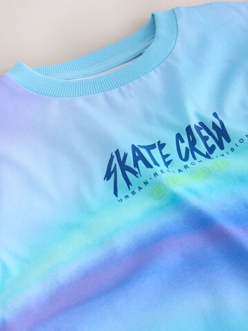 Next - Camiseta en azul