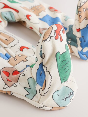 Pijamale 'Tog' de la Next pe bej