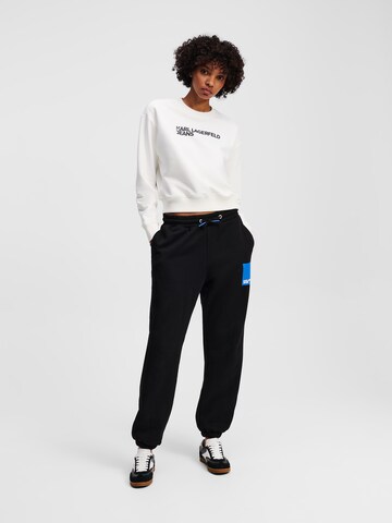 KARL LAGERFELD JEANS Tapered Trousers in Black: front