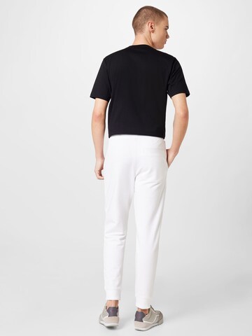 HUGO - Tapered Calças 'Doak' em branco