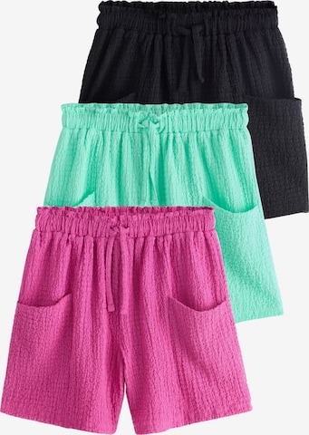 Next Trousers in Green: front