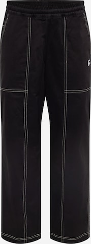 PUMA Loose fit Pants 'Downtown' in Black: front