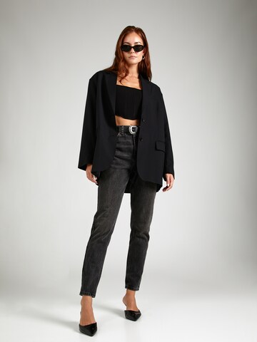 TOPSHOP Tapered Jeans in Black