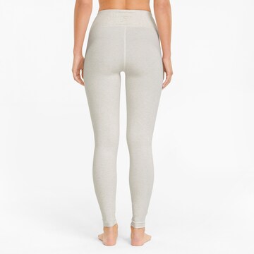 Skinny Pantaloni sportivi 'EXHALE' di PUMA in beige