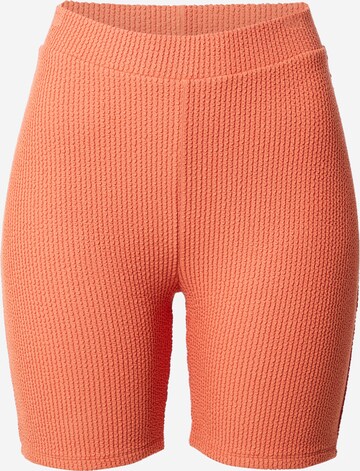 ABOUT YOU x Laura Giurcanu Skinny Leggings 'Jenny' in Oranje: voorkant