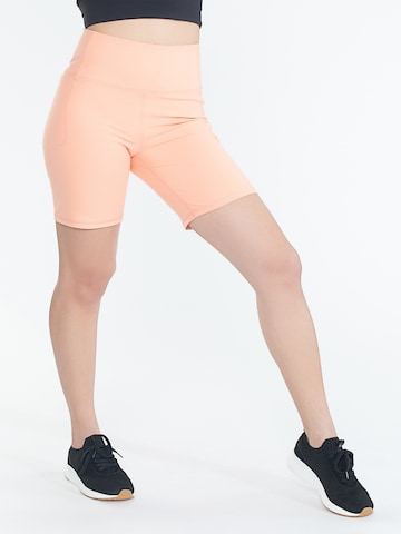 Skinny Pantalon de sport Spyder en orange : devant