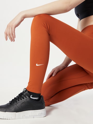 NIKESkinny Sportske hlače 'One' - žuta boja