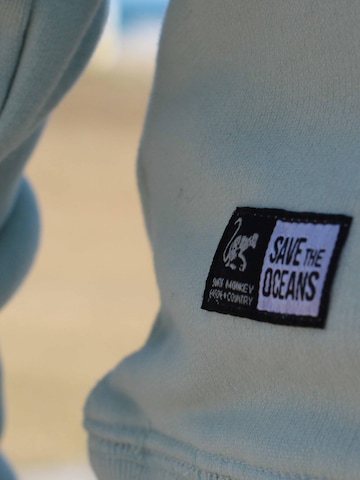 Surf Monkey Sweatshirt‌‌‌‌‌‌‌ in Grün