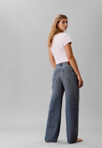 Calvin Klein Jeans Široke hlačnice Kavbojke | modra barva: zadnja stran