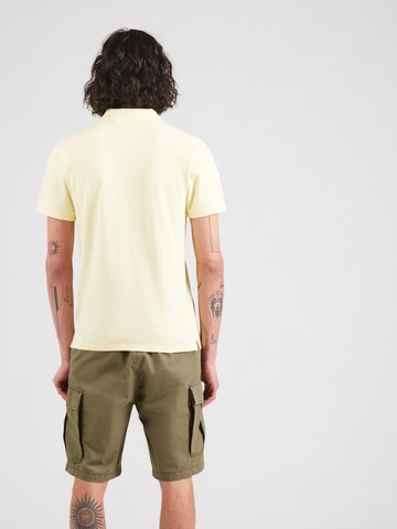 LEVI'S ® Μπλουζάκι 'HOUSEMARK' σε κίτρινο