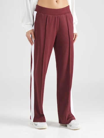 Loosefit Pantaloni di TOMMY HILFIGER in rosso: frontale