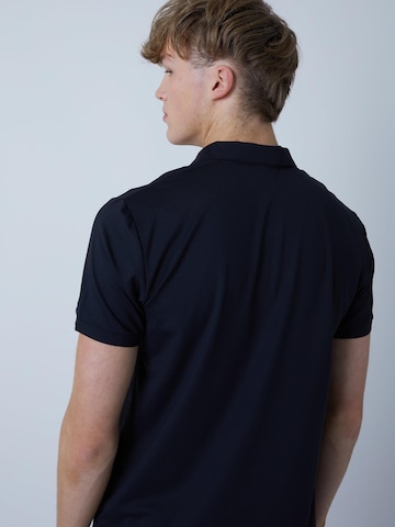 Maglia funzionale 'Polo' di SPORTKIND in nero