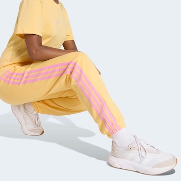 ADIDAS SPORTSWEAR Tapered Sporthose 'Essentials' in Gelb