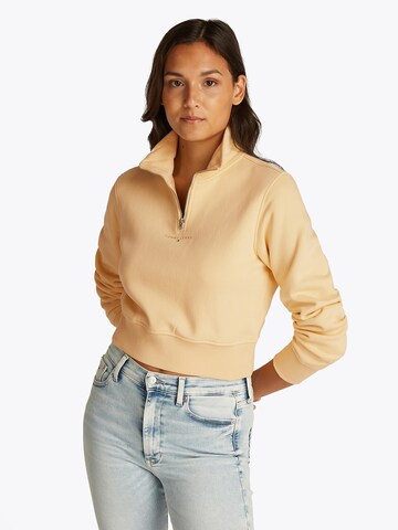 Tommy JeansSweater majica - žuta boja: prednji dio