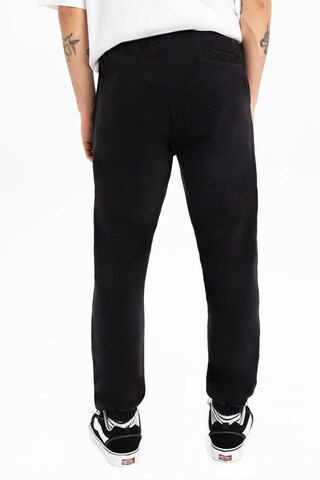 UNIQVIBE Tapered Trousers in Black