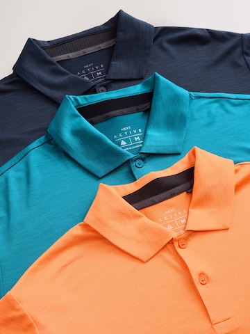 Next Toiminnallinen paita värissä sininen