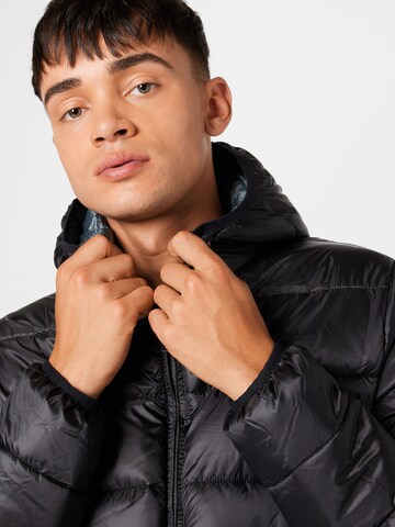 Champion Authentic Athletic Apparel Jacke in Schwarz