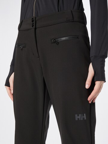 Regular Pantalon outdoor HELLY HANSEN en noir