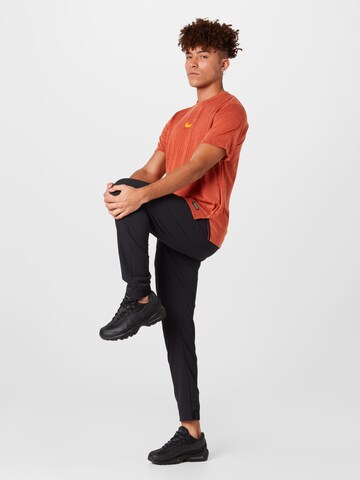 NIKE Performance Shirt 'Pro' in Orange