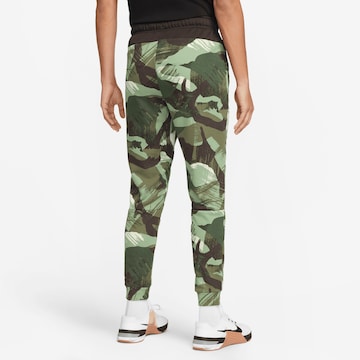 NIKE Tapered Workout Pants in Green