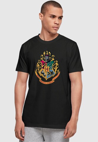 ABSOLUTE CULT Shirt 'Harry Potter - Hogwarts Crest Gold' in Black: front