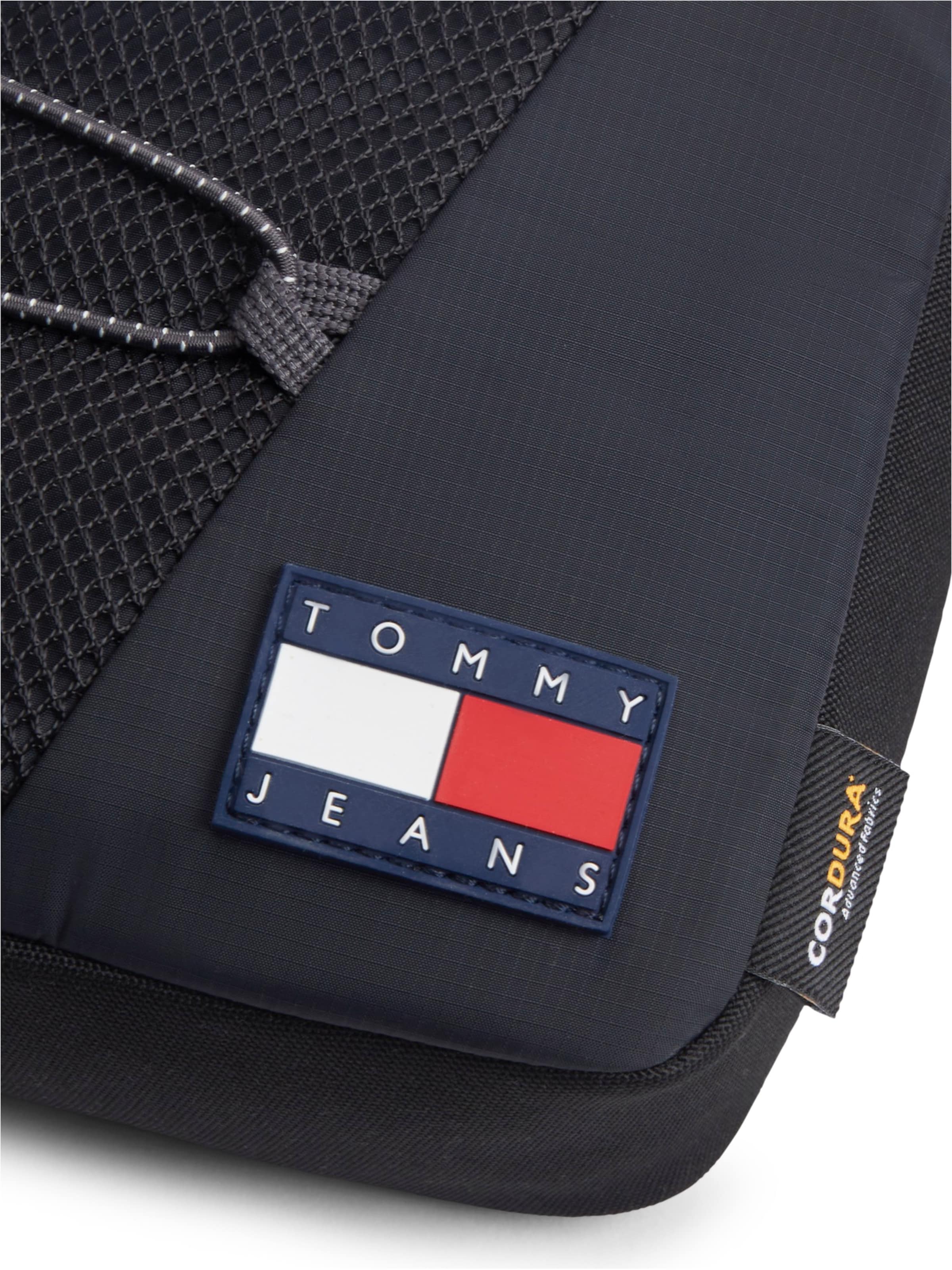 Tommy Jeans Axelremsväska 'REPORTER' i svart