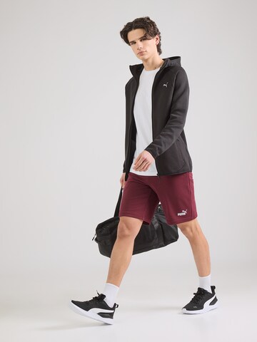 Veste de survêtement 'Evostripe' PUMA en noir