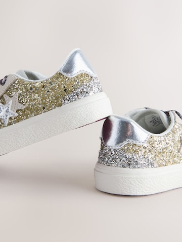 Baskets Next en or