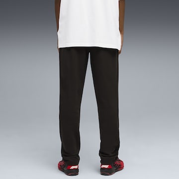 PUMA Regular Sporthose 'F1' in Schwarz