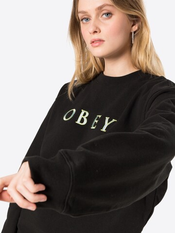 Sweat-shirt Obey en noir