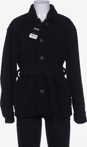 UNIQLO Jacke XS in Schwarz: predná strana