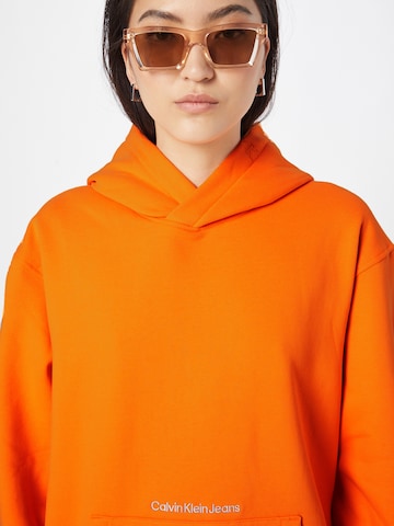 Calvin Klein Jeans Sweatshirt 'Institutional' in Orange